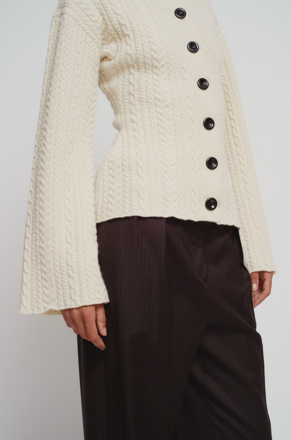 Cable knit corseted cardigan