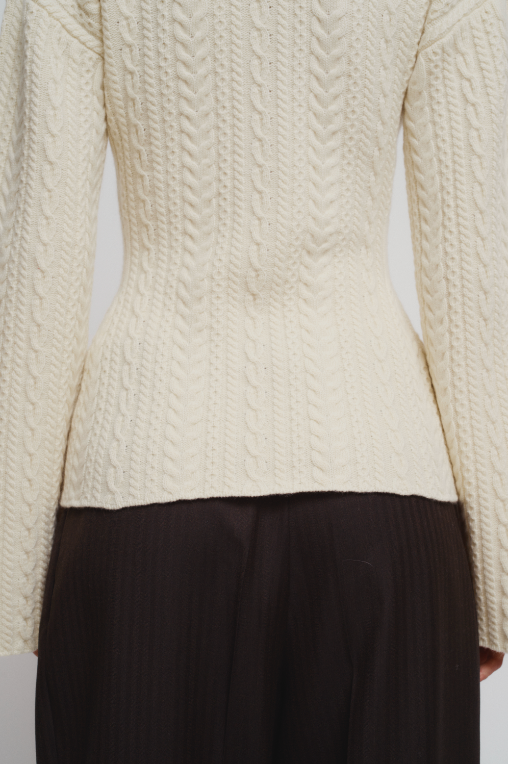 Cable knit corseted cardigan