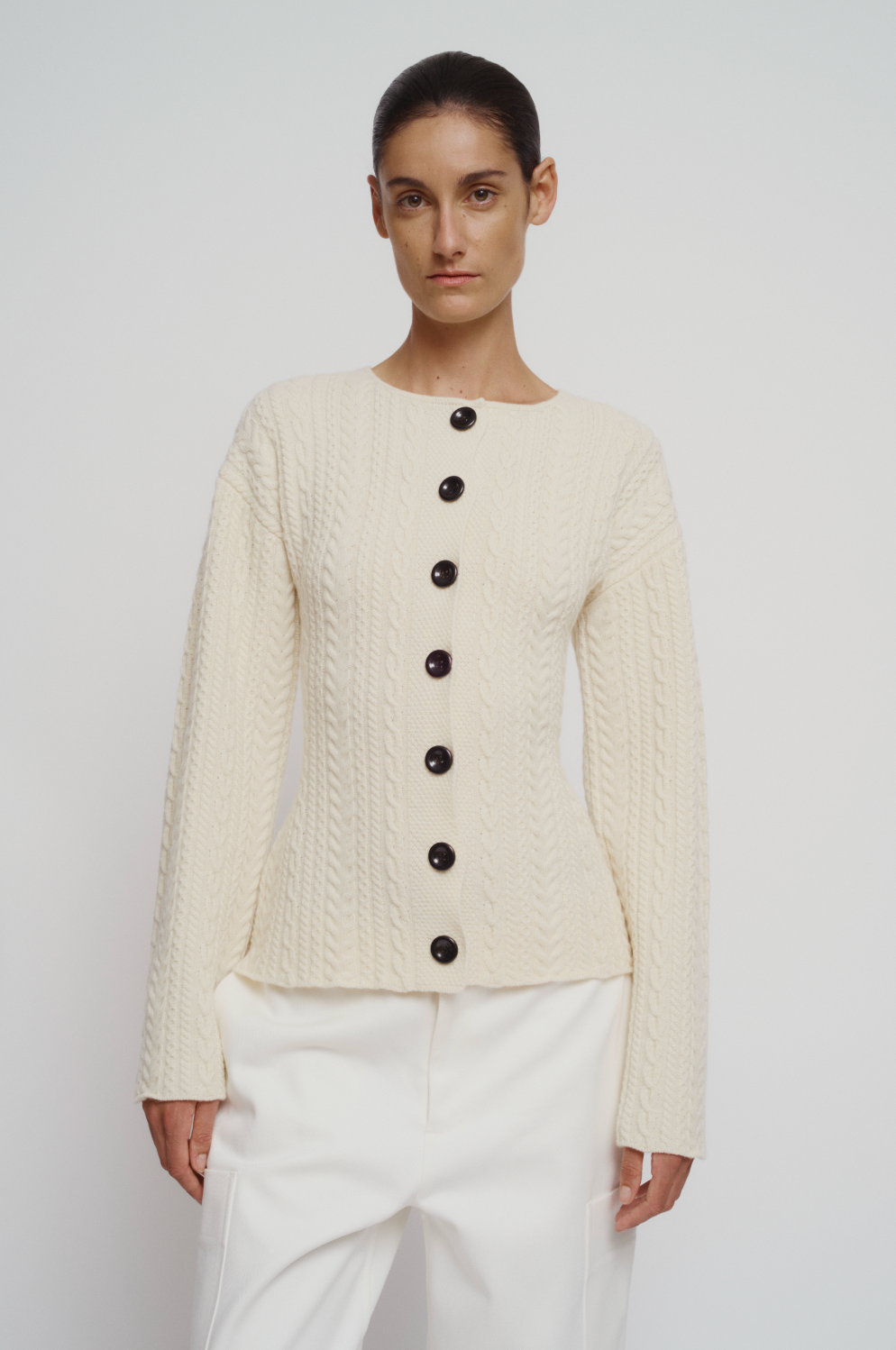Cable knit corseted cardigan
