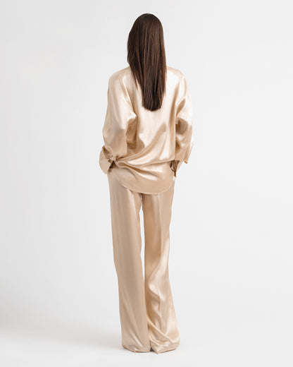 Relaxed pants in liquid gold